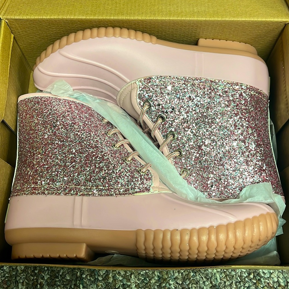 Brand new, never worn. Sparkly baby pink boots. Size 9